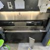 Front opening of a Safan Darley E-BRAKE B press brake with tooling area and safety light strip.