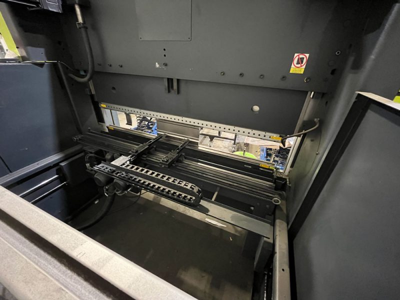 Interior detail of a Safan Darley E-BRAKE B press brake showing the tooling and backgauge area.
