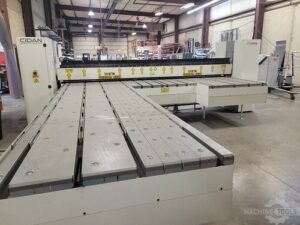 Front view of a Cidan FORMA sheet metal folding machine with segmented work table