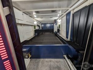 Interior view of HSG G3015X PRO fiber laser cutting machine bed with slatted table