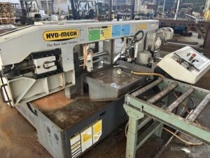 HYD-MECH S-20A horizontal band saw with operator-side controls and roller conveyor