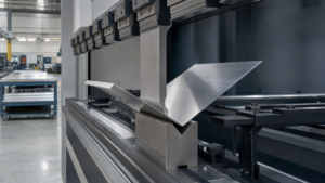 Laser and bending applications performing Stainless sheet air bending on a CNC press brake in a metal fabrication shop